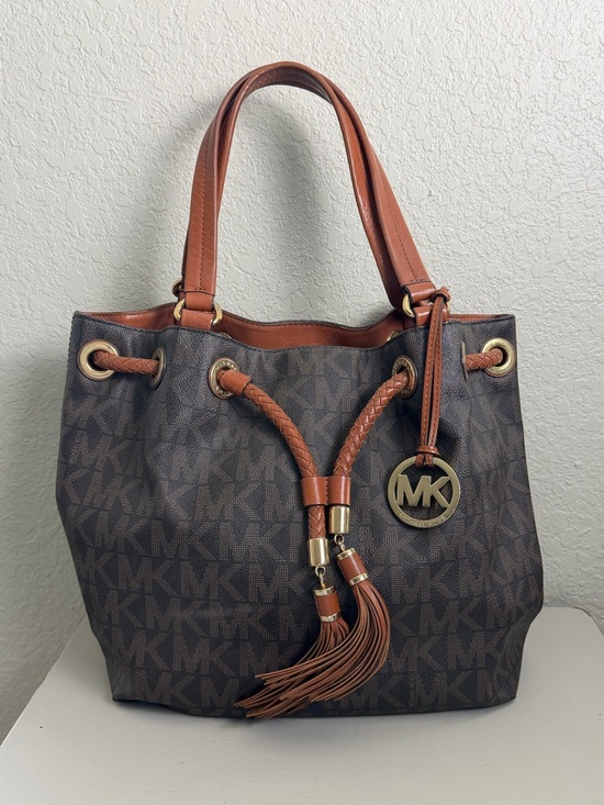 Michael Kors Handbags - MICHAEL Michael Kors MARINA Signature Canvas Tassel Drawstring Large Hobo Bag